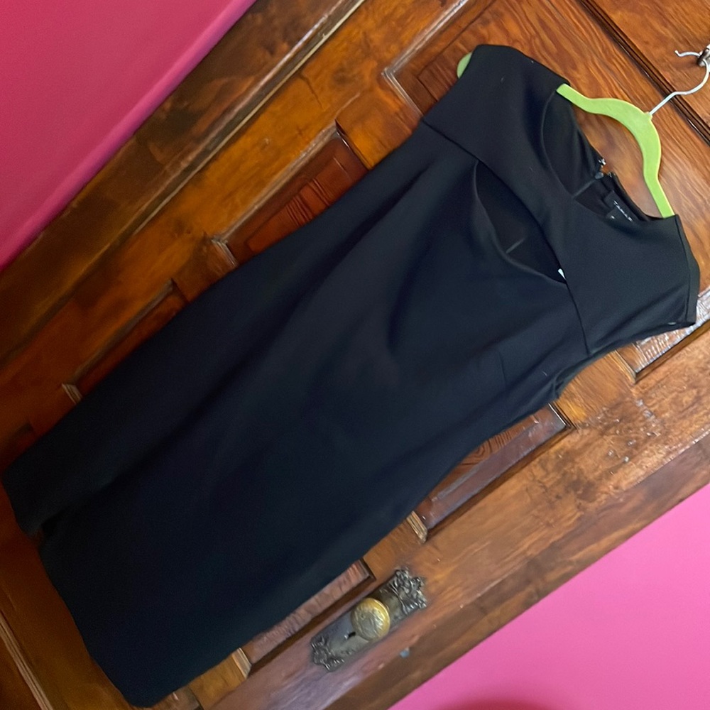 Super cute black dress. Very versatile!